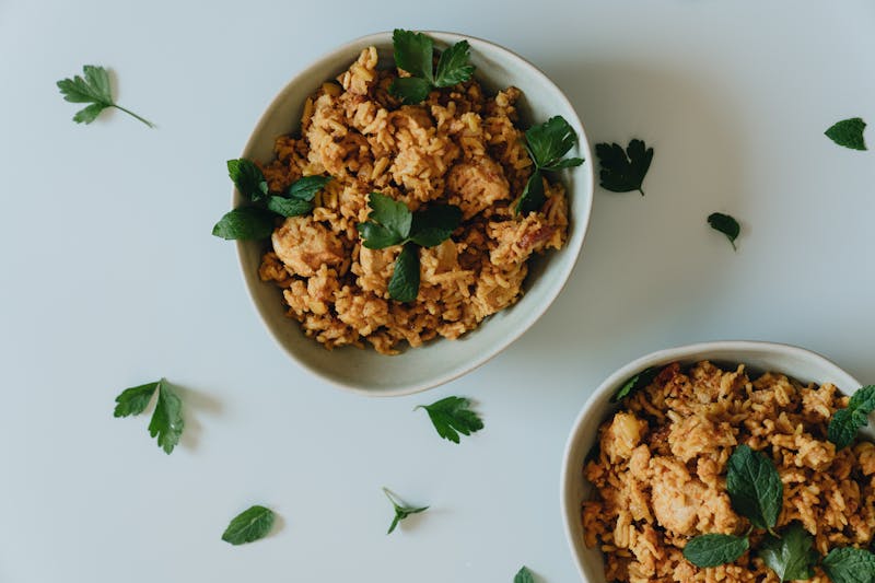 Golden arancini rice balls with marinara dipping sauce
